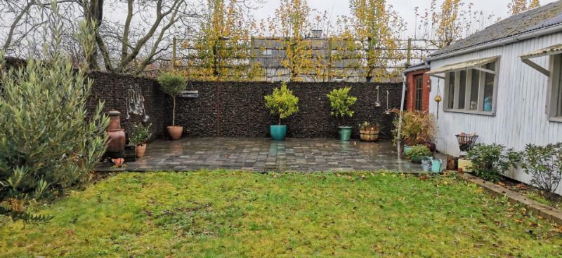 Rood feit ginder N-Immo - Heule, Woning - Charmante woning met tuin en grote garage te koop  in Heule
